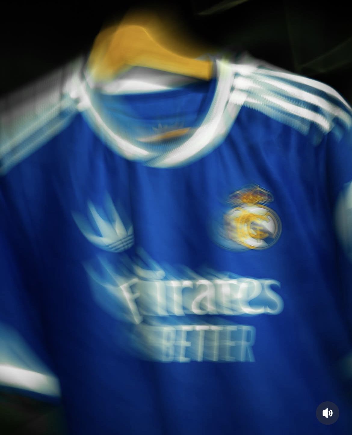 Motion-blurred close-up of a blue football jersey